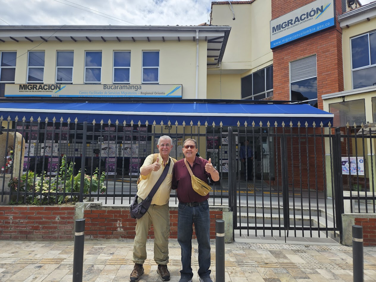 Posing in front of Colombia Migracón office in Bucaramanga, Colombia.